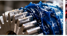 Blue specialty grease on industrial gearing